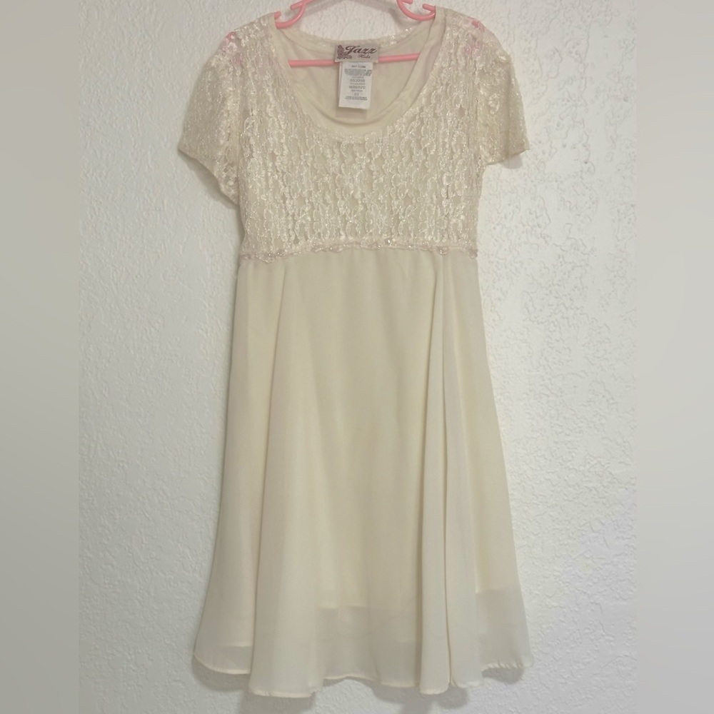 Vintage Jazz, girl's cream dress.